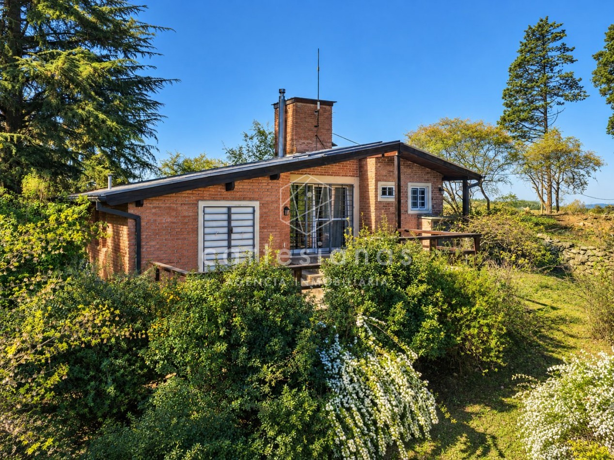 VILLA BERNA. EN VENTA PROPIEDAD DE 2,5 HECTAREAS CON 2 CABAÑAS.